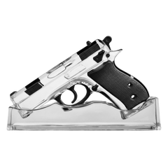 Clear crystal gun-shaped object on a white background