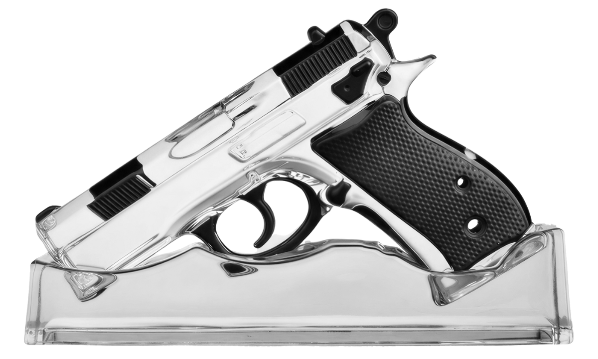 Clear crystal gun-shaped object on a white background