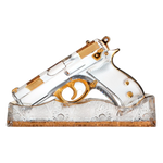 Decorative glass gun with gold accents on a white background